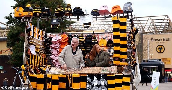 WOLVERHAMPTON, ENGLAND - NOVEMBER 02: Merchandise is seen for sale outside the stadium prior to the Premier League match between Wolverhampton Wanderers FC and Crystal Palace FC at Molineux on November 02, 2024 in Wolverhampton, England. (Photo by Nathan Stirk/Getty Images)