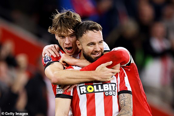 SOUTHAMPTON, ENGLAND - NOVEMBER 02: Adam Armstrong of Southampton celebrates scoring his team's first goal with teammate Tyler Dibling during the Premier League match between Southampton FC and Everton FC at St Mary's Stadium on November 02, 2024 in Southampton, England. (Photo by Charlie Crowhurst/Getty Images)