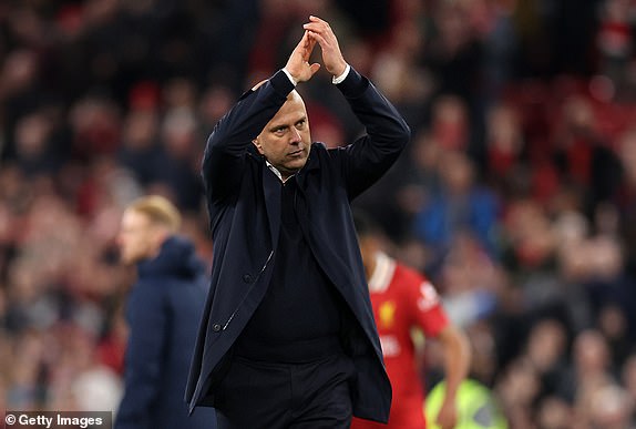 LIVERPOOL, ENGLAND - NOVEMBER 02: Arne Slot, Manager of Liverpool, applauds the fans after the team's victory in the Premier League match between Liverpool FC and Brighton & Hove Albion FC at Anfield on November 02, 2024 in Liverpool, England. (Photo by Jan Kruger/Getty Images)