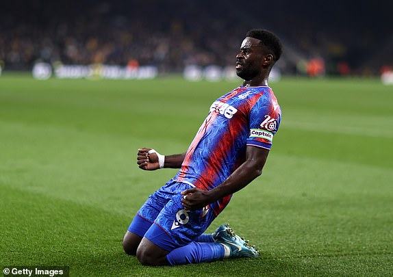 WOLVERHAMPTON, ENGLAND - NOVEMBER 02: Marc Guehi of Crystal Palace celebrates scoring his team's second goal during the Premier League match between Wolverhampton Wanderers FC and Crystal Palace FC at Molineux on November 02, 2024 in Wolverhampton, England. (Photo by Naomi Baker/Getty Images)