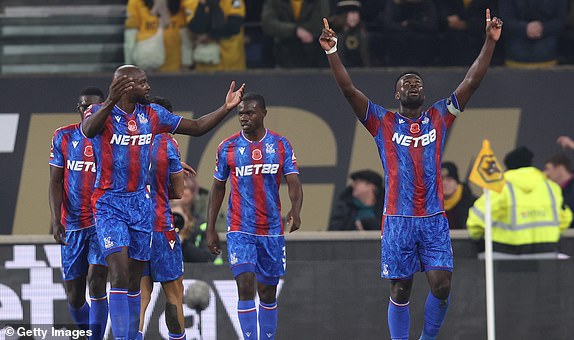 WOLVERHAMPTON, ENGLAND - NOVEMBER 02: Marc Guehi of Crystal Palace celebrates scoring his team's second goal during the Premier League match between Wolverhampton Wanderers FC and Crystal Palace FC at Molineux on November 02, 2024 in Wolverhampton, England. (Photo by Nathan Stirk/Getty Images)