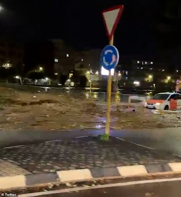 Roads were instantly turned into rivers as the torrential rain fell relentlessly across parts of Spain