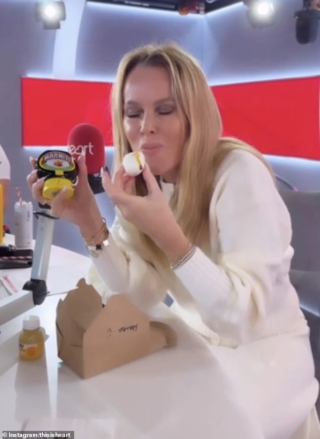 Amanda sent fans wild with her food hack on Tuesday as she shared a clip of herself pouring marmite onto a boiled egg