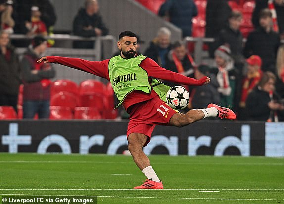 LIVERPOOL, ENGLAND - NOVEMBER 05: (THE SUN OUT, THE SUN ON SUNDAY OUT)  Mohamed Salah of Liverpool durring the warm-up before the UEFA Champions League 2024/25 League Phase MD4 match between Liverpool FC and Bayer 04 Leverkusen at Anfield on November 05, 2024 in Liverpool, England. (Photo by John Powell/Liverpool FC via Getty Images)