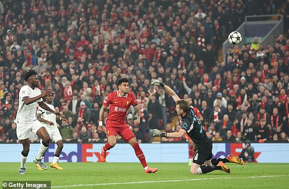 LIVERPOOL, ENGLAND - NOVEMBER 05: Luis Diaz of Liverpool scores his team's first goal during the UEFA Champions League 2024/25 League Phase MD4 match between Liverpool FC and Bayer 04 Leverkusen at Anfield on November 05, 2024 in Liverpool, England. (Photo by Carl Recine/Getty Images)