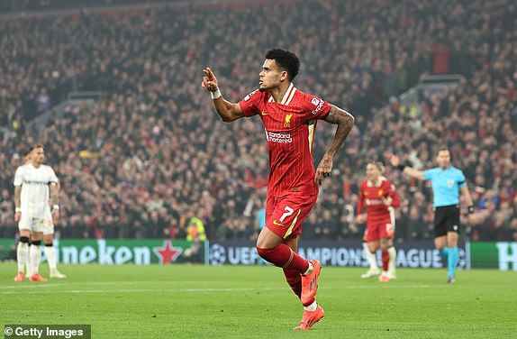 LIVERPOOL, ENGLAND - NOVEMBER 05: Luis Diaz of Liverpool celebrates scoring his team's first goal during the UEFA Champions League 2024/25 League Phase MD4 match between Liverpool FC and Bayer 04 Leverkusen at Anfield on November 05, 2024 in Liverpool, England. (Photo by Carl Recine/Getty Images)