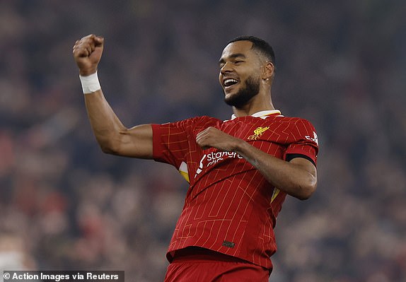 Soccer Football - Champions League - Liverpool v Bayer Leverkusen - Anfield, Liverpool, Britain - November 5, 2024 Liverpool's Cody Gakpo celebrates scoring their second goal Action Images via Reuters/Jason Cairnduff