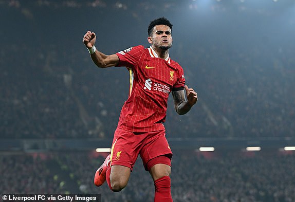 LIVERPOOL, ENGLAND - NOVEMBER 05: (THE SUN OUT, THE SUN ON SUNDAY OUT) Luis Diaz of Liverpool celebrating after scoring the opening goal  during the UEFA Champions League 2024/25 League Phase MD4 match between Liverpool FC and Bayer 04 Leverkusen at Anfield on November 05, 2024 in Liverpool, England. (Photo by John Powell/Liverpool FC via Getty Images)