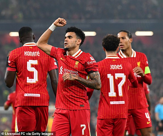 LIVERPOOL, ENGLAND - NOVEMBER 05: (THE SUN OUT, THE SUN ON SUNDAY OUT) Luis Diaz of Liverpool celebrating after scoring the opening goal during the UEFA Champions League 2024/25 League Phase MD4 match between Liverpool FC and Bayer 04 Leverkusen at Anfield on November 05, 2024 in Liverpool, England. (Photo by John Powell/Liverpool FC via Getty Images)