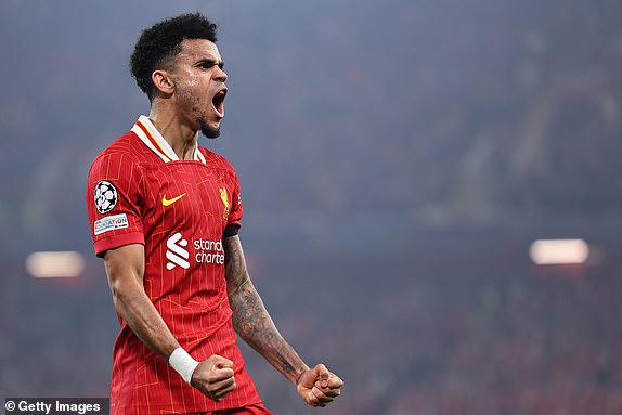 LIVERPOOL, ENGLAND - NOVEMBER 5: Luis Diaz of Liverpool celebrates after scoring a goal to make it 3-0 during the UEFA Champions League 2024/25 League Phase MD4 match between Liverpool FC and Bayer 04 Leverkusen at Anfield on November 5, 2024 in Liverpool, England. (Photo by Robbie Jay Barratt - AMA/Getty Images)