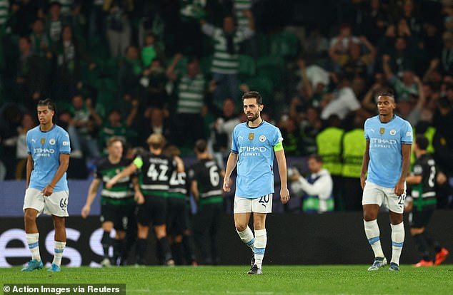 Bernardo Silva (centre) has claimed that Manchester City are in a 'dark place' at the moment