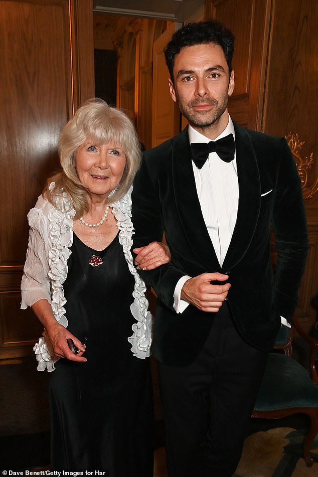 Rivals' Dame Jilly Cooper, winner of the Writer award, and Aidan Turner posed for a photo