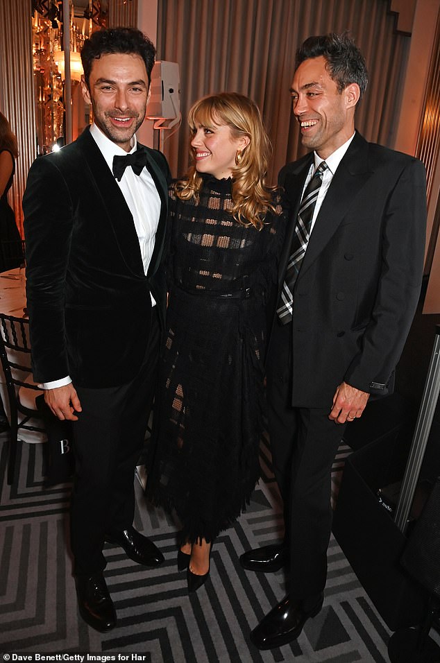 Aidan, Bella and Alex Hassell all posed for a photo together during the glamorous evening