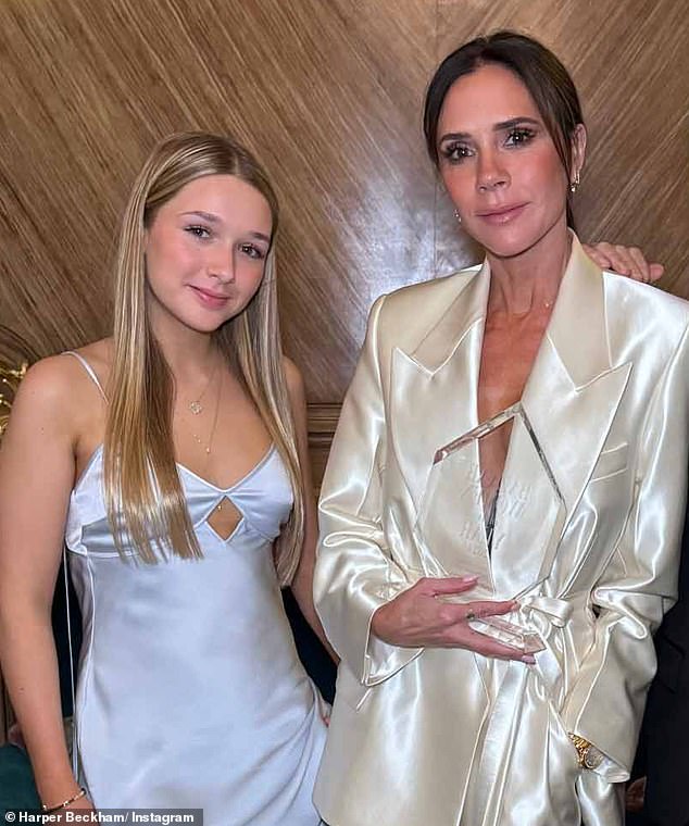 The fashion designer, 50, was given the award by her daughter Harper, 13, in front of a room full of celebrities at Harper's Bazaar's Women Of The Year ceremony