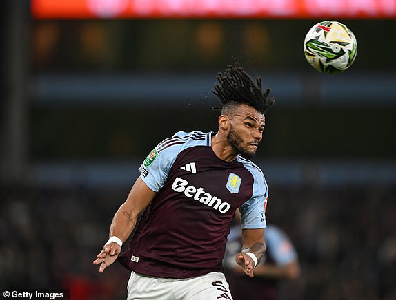 BIRMINGHAM, ENGLAND - OCTOBER 30: Tyrone Mings of Aston Villa heads the ball during the Carabao Cup Fourth Round match between Aston Villa and Crystal Palace at Villa Park on October 30, 2024 in Birmingham, England. (Photo by Shaun Botterill/Getty Images)