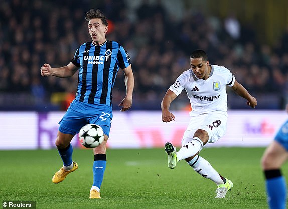 Soccer Football - Champions League - Club Brugge v Aston Villa - Jan Breydel Stadium, Bruges, Belgium - November 6, 2024 Aston Villa's Youri Tielemans in action with Club Brugge's Casper Nielsen REUTERS/Yves Herman