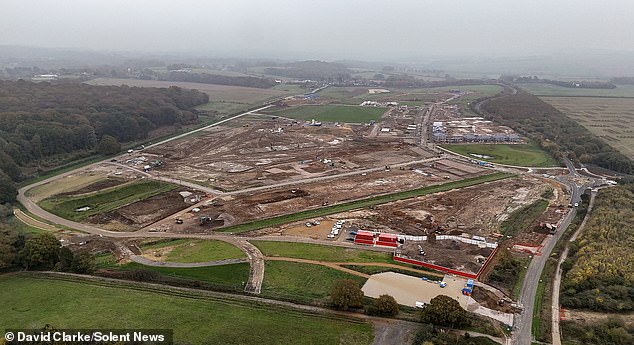 Locals say the development to build a 'garden village' on 1,000 acres of open land has caused traffic chaos for shift workers who struggled to get back to their homes after road closures