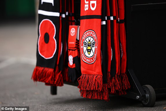 BRENTFORD, ENGLAND - NOVEMBER 09: Merchandise is seen for sale outside the stadium prior to the Premier League match between Brentford FC and AFC Bournemouth at Gtech Community Stadium on November 09, 2024 in Brentford, England. (Photo by Ben Hoskins/Getty Images)