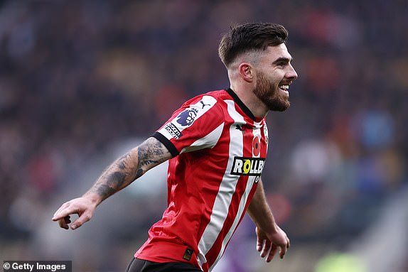 WOLVERHAMPTON, ENGLAND - NOVEMBER 09: Ryan Manning of Southampton celebrates scoring a goal, which was later ruled out following a VAR review during the Premier League match between Wolverhampton Wanderers FC and Southampton FC at Molineux on November 09, 2024 in Wolverhampton, England. (Photo by Naomi Baker/Getty Images)