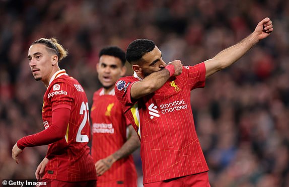 LIVERPOOL, ENGLAND - NOVEMBER 02: Mohamed Salah of Liverpool celebrates scoring his team's second goal during the Premier League match between Liverpool FC and Brighton & Hove Albion FC at Anfield on November 02, 2024 in Liverpool, England. (Photo by Jan Kruger/Getty Images)