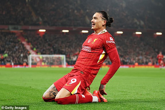 LIVERPOOL, ENGLAND - NOVEMBER 09: Darwin Nunez of Liverpool celebrates scoring his team's first goal during the Premier League match between Liverpool FC and Aston Villa FC at Anfield on November 09, 2024 in Liverpool, England. (Photo by Carl Recine/Getty Images)