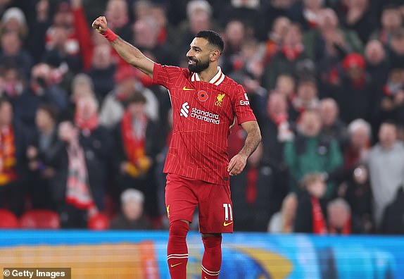 LIVERPOOL, ENGLAND - NOVEMBER 9: Mohamed Salah of Liverpool celebrates after scoring a goal to make it 2-0 during the Premier League match between Liverpool FC and Aston Villa FC at Anfield on November 9, 2024 in Liverpool, England. (Photo by Robbie Jay Barratt - AMA/Getty Images)