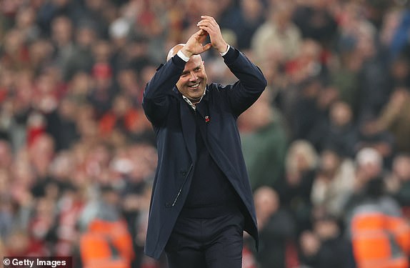 LIVERPOOL, ENGLAND - NOVEMBER 09: Arne Slot, Manager of Liverpool, acknowledges the fans following the team's victory during the Premier League match between Liverpool FC and Aston Villa FC at Anfield on November 09, 2024 in Liverpool, England. (Photo by Carl Recine/Getty Images)