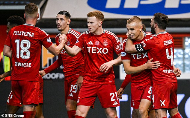 Topi Keskinen (second right) celebrates his goal with his Pittodrie team-mates