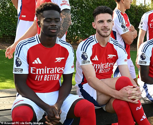 Madueke wants to beat Arsenal stars Declan Rice (right) and Bukayo Saka (left) ahead of the international break