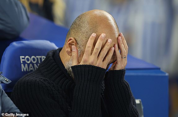 BRIGHTON, ENGLAND - NOVEMBER 9: Josep Guardiola Manager of Manchester City looks disappointed as he gestures during the Premier League match between Brighton & Hove Albion FC and Manchester City FC at Amex Stadium on November 9, 2024 in Brighton, England. (Photo by Crystal Pix/MB Media/Getty Images)