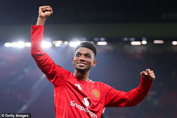 MANCHESTER, ENGLAND - NOVEMBER 07: Amad Diallo of Manchester United celebrates after the UEFA Europa League 2024/25 League Phase MD4 match between Manchester United and PAOK FC at Old Trafford on November 07, 2024 in Manchester, England. (Photo by James Gill - Danehouse/Getty Images)