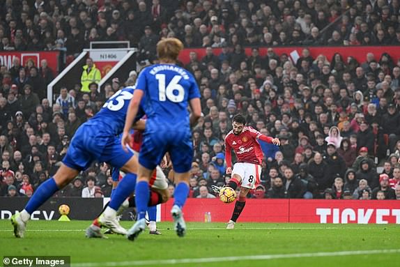 MANCHESTER, ENGLAND - NOVEMBER 10: Bruno Fernandes of Manchester United scores his team's first goal during the Premier League match between Manchester United FC and Leicester City FC at Old Trafford on November 10, 2024 in Manchester, England. (Photo by Michael Regan/Getty Images)