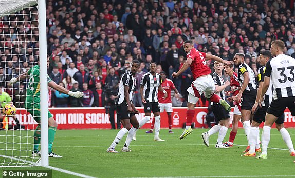 NOTTINGHAM, ENGLAND - NOVEMBER 10: Murillo of Nottingham Forest scores his team's first goal past Nick Pope of Newcastle United during the Premier League match between Nottingham Forest FC and Newcastle United FC at City Ground on November 10, 2024 in Nottingham, England. (Photo by Alex Livesey/Getty Images)