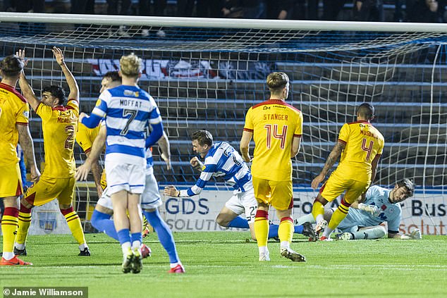 Wilson runs away in delight after opening the scoring for Morton