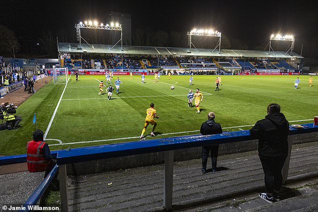 Supporters enjoy the unique Cappielow atmosphere under the Friday-night lights