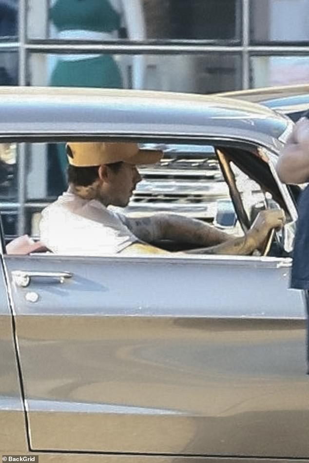 Brooklyn Beckham went for a spin around Los Angeles in his classic Mustang on Friday