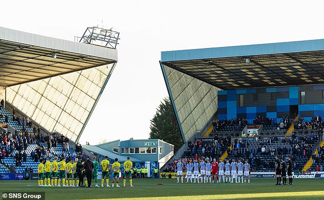 Jeers were audible from the away end as both teams paid their respects in the centre circle