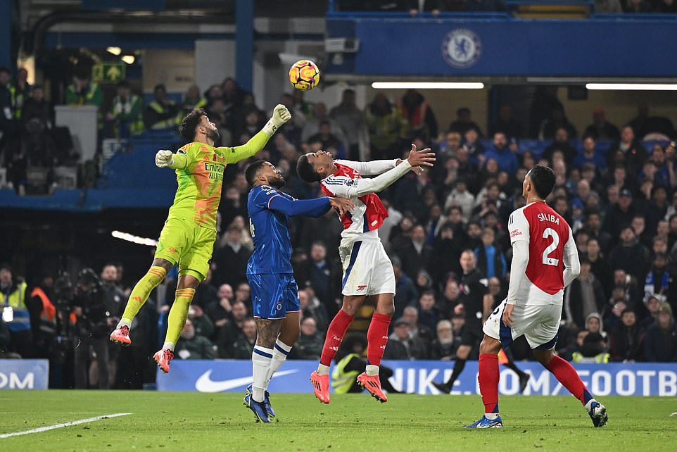 David Raya punches clear with a firm left hand for the Gunners after Chelsea opt for the aerial route at Stamford Bridge