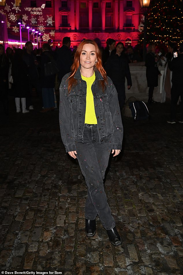 Arielle Free stood out in a neon green jumper underneath her layers