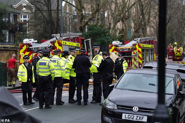 Fire engines and police officers on Seagrave Road in Fulham, west London, as firefighters tackled the blaze at London Oratory School on December 27, 2023