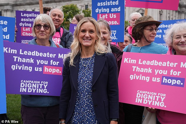 Labour MP Kim Leadbeater (centre) pictured with Dignity in Dying campaigners last month