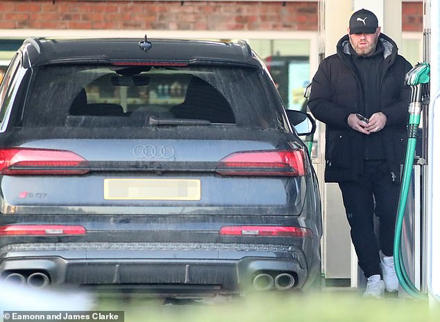 The football manager, 39, was spotted filling up his car at the petrol station near his home