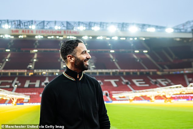 Ruben Amorim poses for his first pictures at Old Trafford after being named Man United head coach