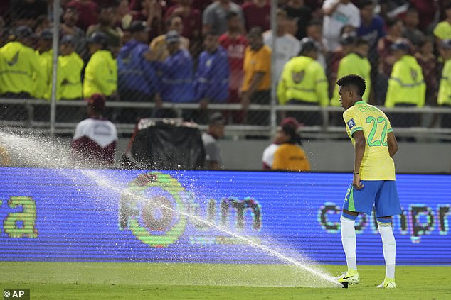 Chelsea youngster Estevao Willian could be seen trying to stop the flow of water shooting out