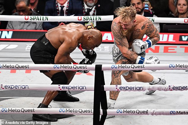 Jake Paul (right) beat Mike Tyson (left) by unanimous decision in Arlington on Friday night