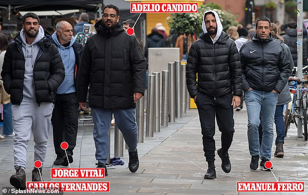 Ruben Amorim (second right) has been spotted taking a walk through Manchester with his coaching staff