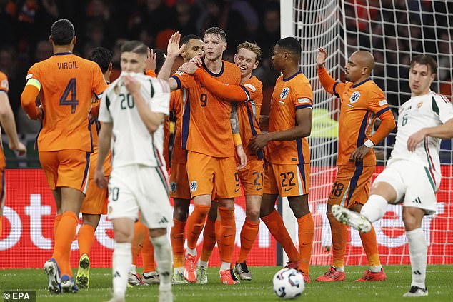 A Netherlands striker was criticised for celebrating in light of a rival coach collapsing prior