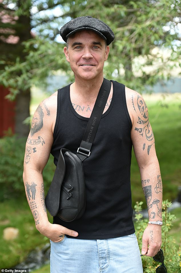 Robbie Williams has written an open letter to Take That's former manager Nigel Martin-Smith, hitting back at claims over his drug taking and saying he 'doesn't like' his former boss