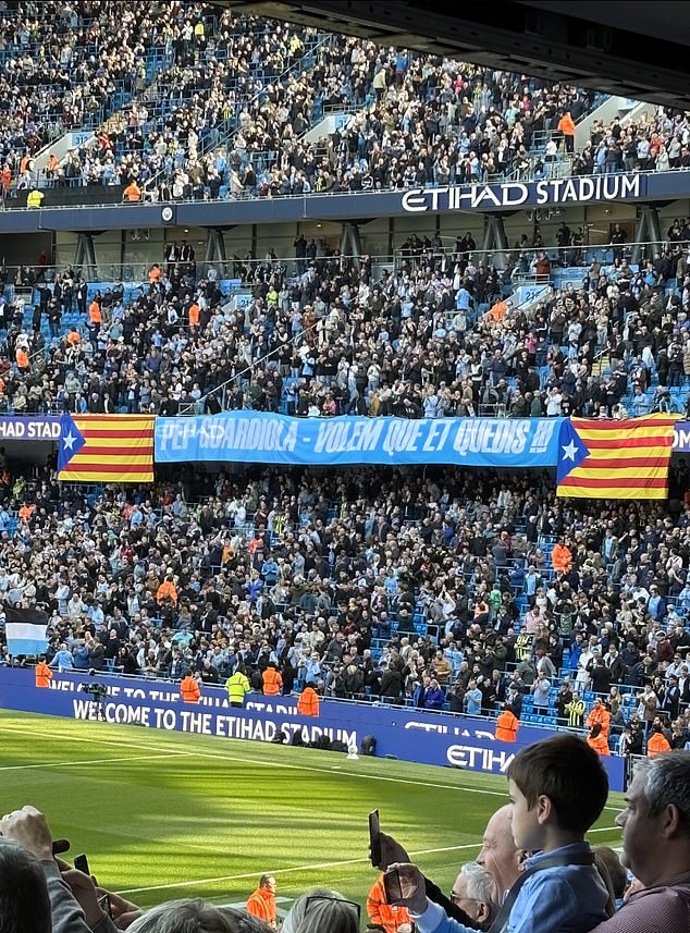 City fans crowded funded a banner that read in Catalan: 'Pep Guardiola, we want you to stay'