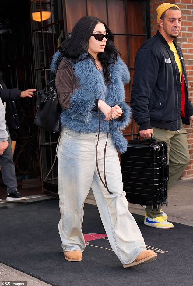 Charli XCX cut a casual figure as she stepped out in New York City on Tuesday fresh off hosting Saturday Night Live